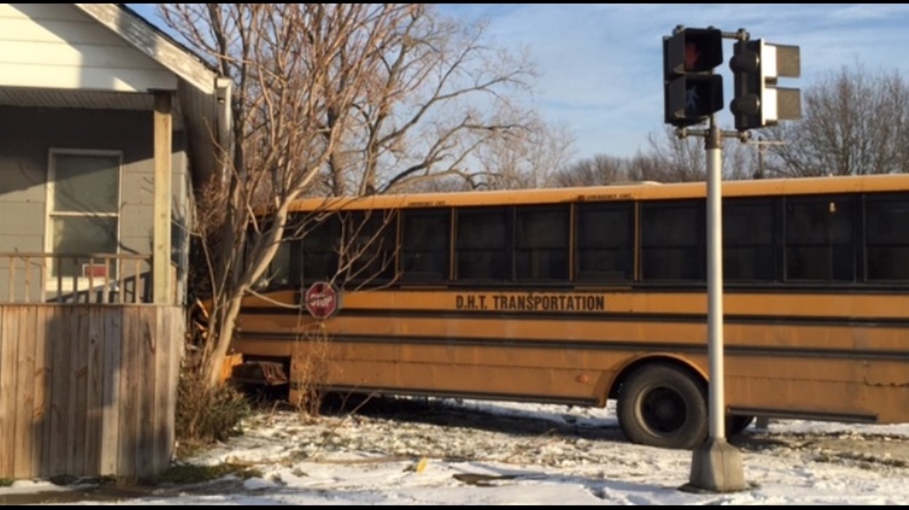 School bus hits house in Dearborn Heights